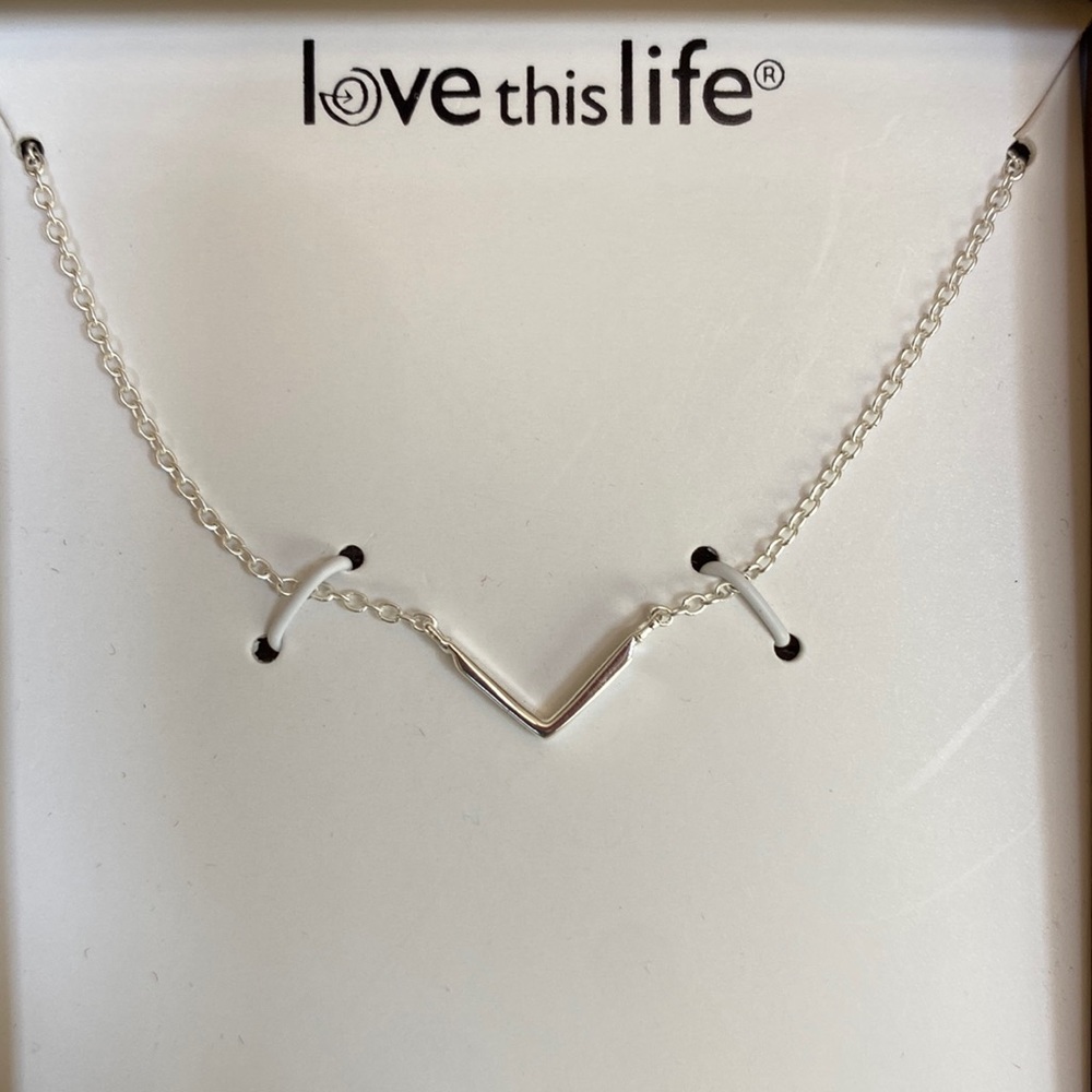 16-18” adjustable sterling silver necklace with “v” shape
